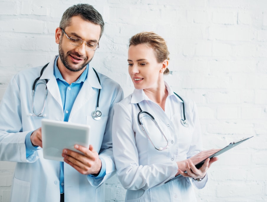 Oncology Two Medical Students Sharing Information