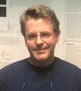 Dr. Michael Migden